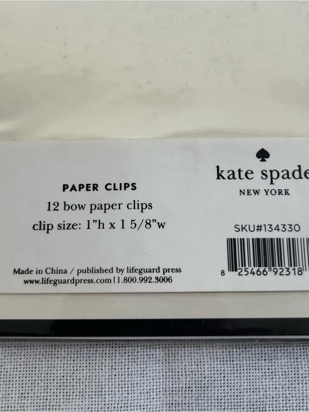 kate spade gold bow paper clips - 12 per package.